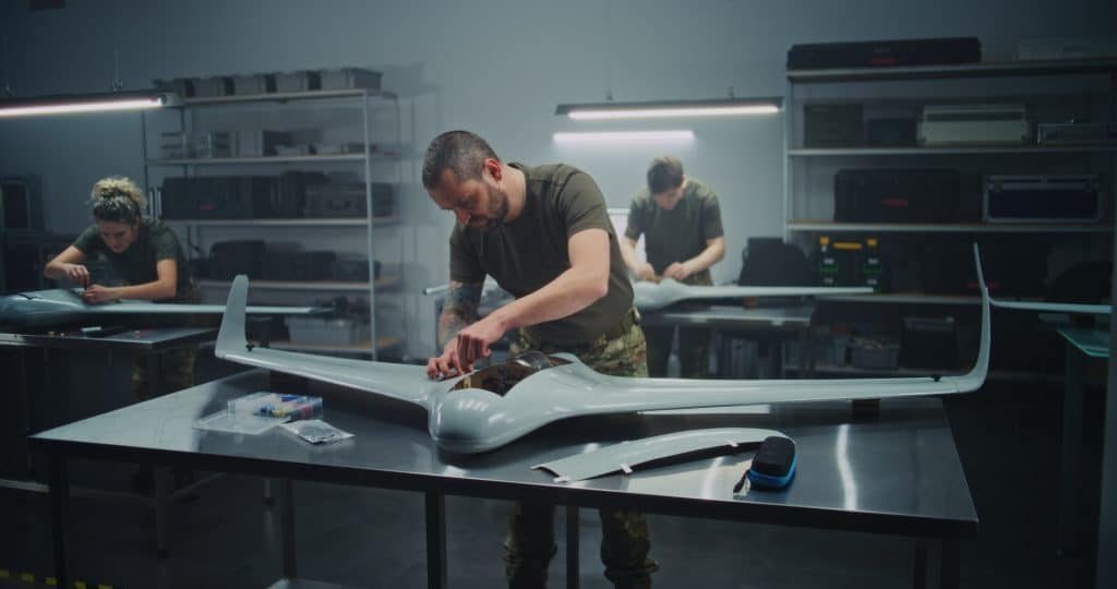 Synchronized Drone Production Team Simultaneously Assembling Large UAV
